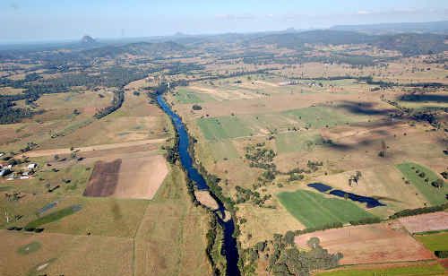 The view of the Mary River, as seen by then-Premier Peter Beattie as he flew over the dam site on the day of the proposal’s announcement. The view of the Mary River, as seen by then-Premier Peter Beattie as he flew over the dam site on the day of the proposal’s announcement.